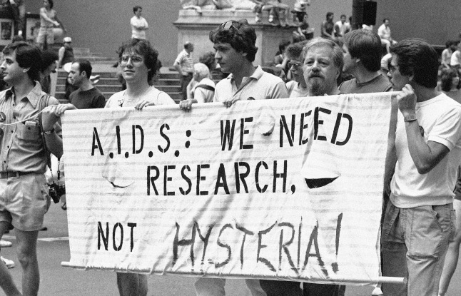 A group advocating AIDS research marches down Fifth Avenue during the 14th annual Lesbian and Gay Pride parade in New York, June 27, 1983. Mario Suriani/Associated Press