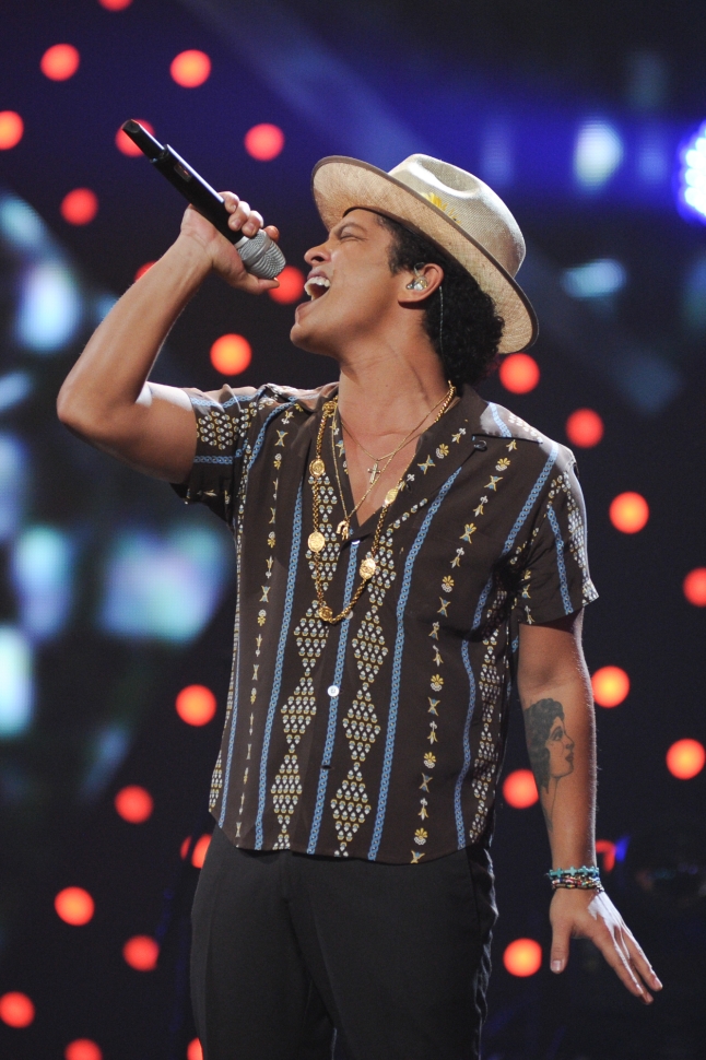 Bruno Mars performs onstage during the iHeartRadio Music Festival at the MGM Grand Garden Arena on September 21, 2013 in Las Vegas, Nevada. (Photo by Brian Friedman/Getty Images for Clear Channel)