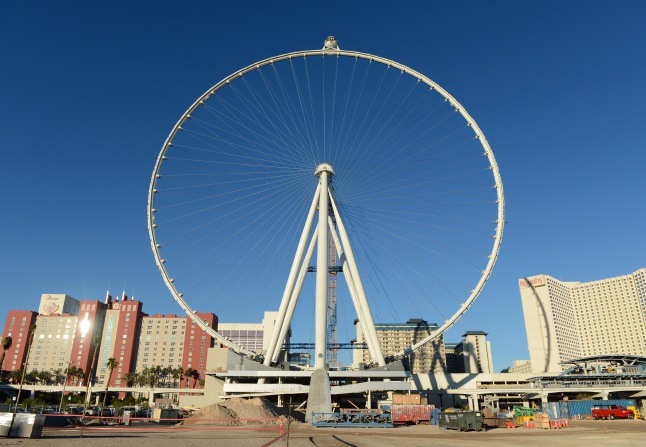 The first passenger cabin is rotated to the top of the Las Vegas High Roller, officially making it the world’s tallest observation wheel at 550 feet. Photo Credit: Denise Truscello