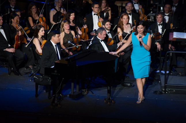 Oscar® nominees Robert Lopez and Kristen Anderson-Lopez performs "Let It Go" from the film "Frozen" during the Academy of Motion Picture Arts and Sciences' “The Oscar Concert” on Thursday, February 27, 2014 at Royce Hall in Los Angeles. 