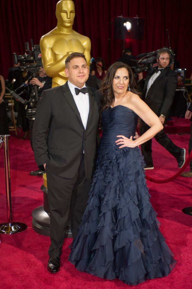Oscar®-nominated actor Jonah Hill and Sharon Lyn Chalkin arrive for the live ABC Telecast of The 86th Oscars® at the Dolby® Theatre on March 2, 2014 in Hollywood, CA.