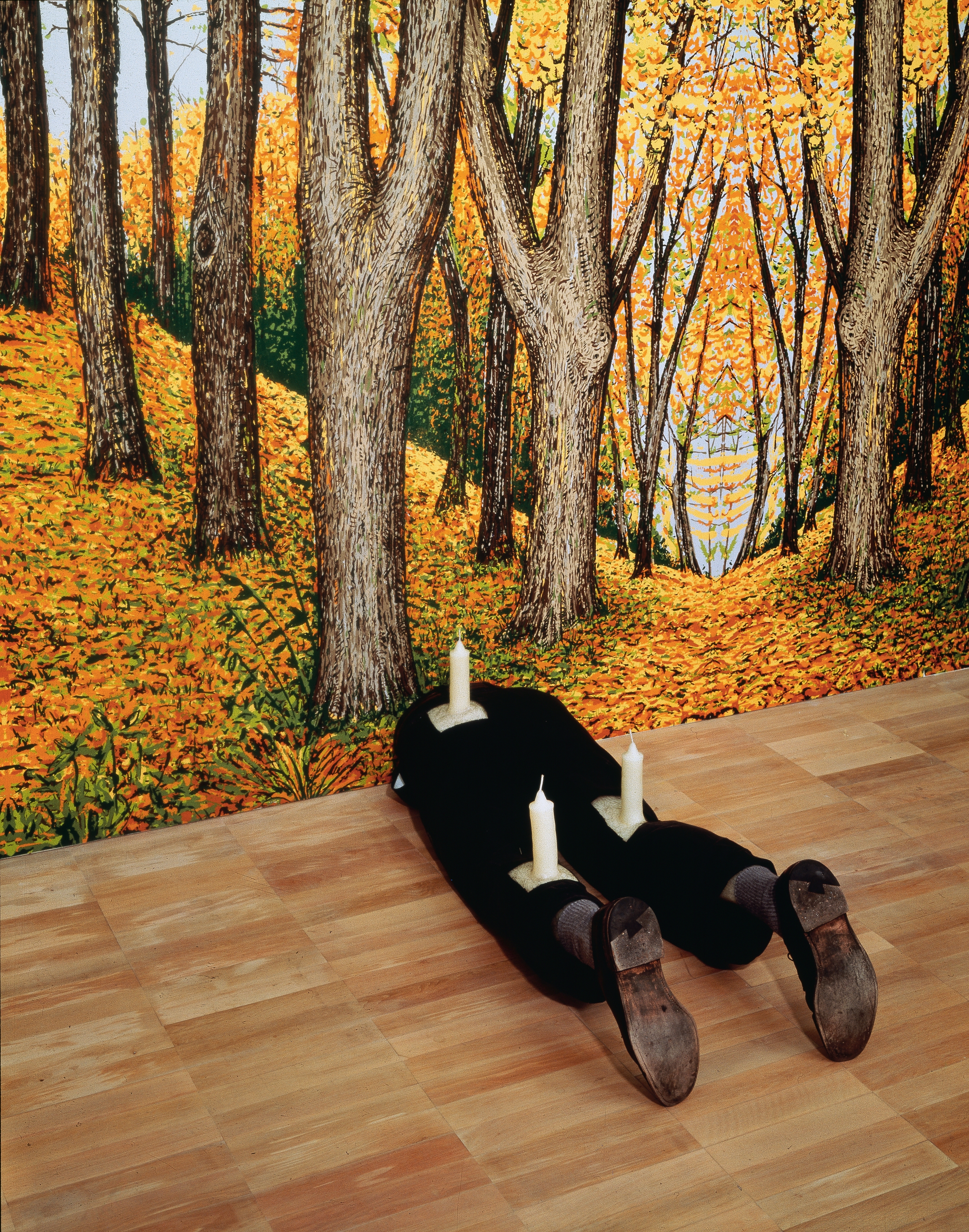 Robert Gober (American, born 1954) Untitled. 1991 Wood, beeswax, leather, fabric, and human hair. 13 1/4 x 16 1/2 x 46 1/8″ (33.6 x 41.9 x 117.2 cm)  The Museum of Modern Art, New York. Gift of Werner and Elaine Dannheisser Background: Forest, 1991 Hand-painted silkscreen on paper Image Credit: K. Ignatiadis, courtesy the artist and Matthew Marks Gallery © 2014 Robert Gober