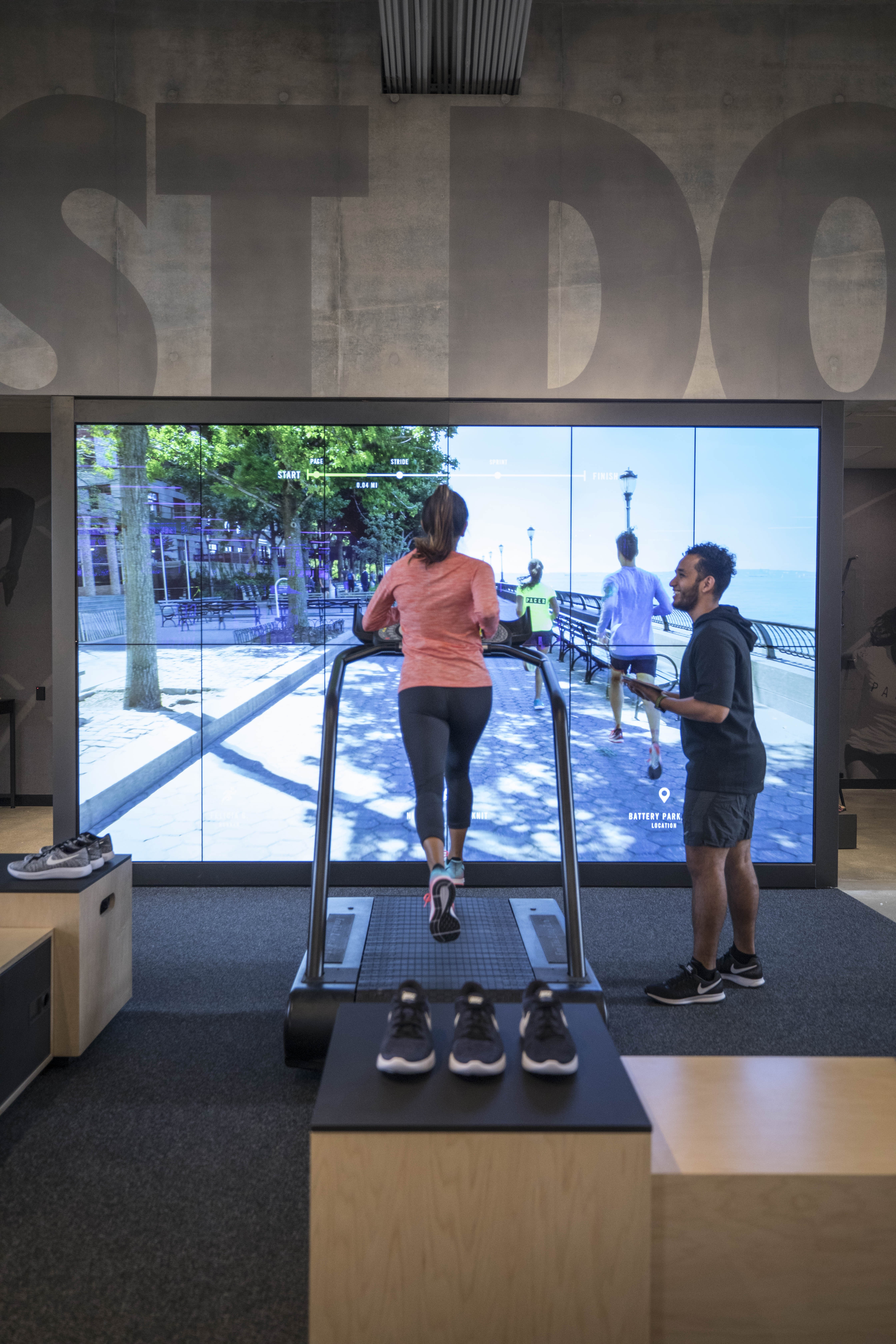 the-nike-running-trial-zone-located-on-the-first-floor-allows-consumers-to-test-shoes-on-a-treadmill-surrounded-by-two-cameras-capturing-data-from-their-run